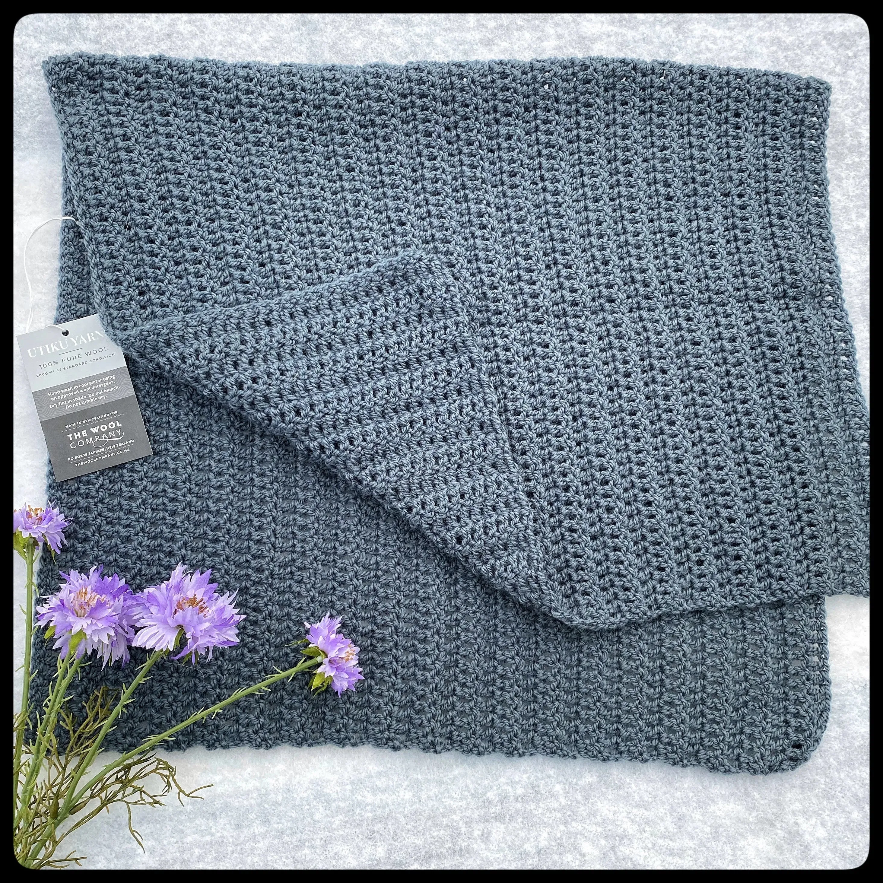 "Eyelet" wool baby blanket